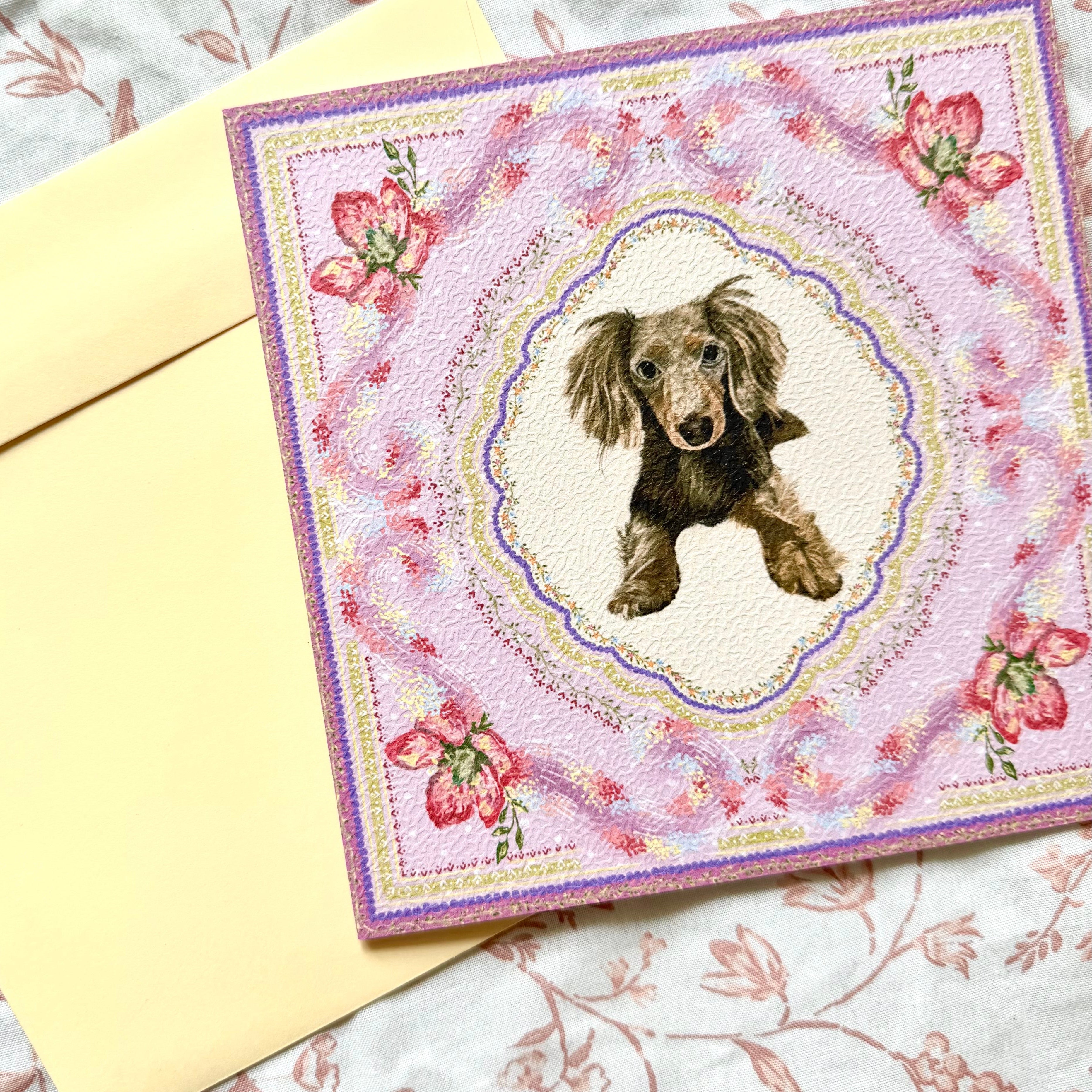 "Wisteria Petal Reverie" Chocolate Dapple Long-Haired Dachshund Greeting Card